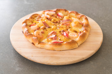 Homemade hawaiian seafood pizza