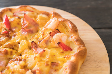 Homemade hawaiian seafood pizza