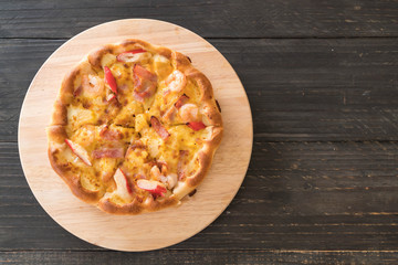 Homemade hawaiian seafood pizza