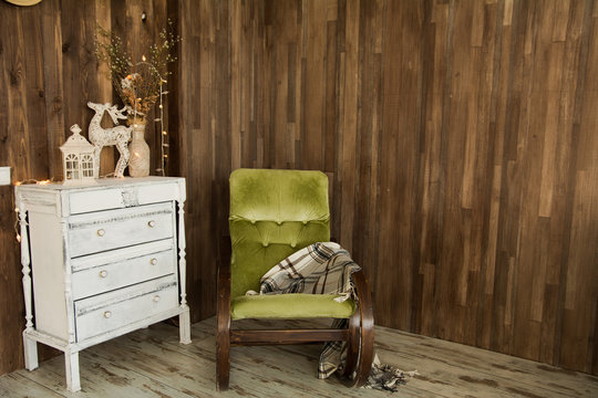 Interior room with chest of drawers and an old chair