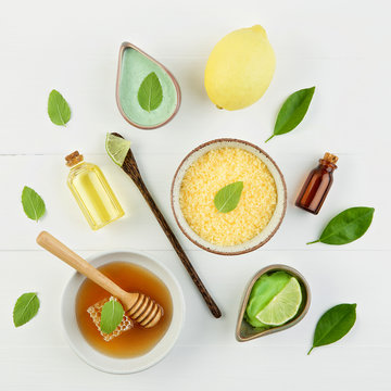 Homemade lemon essential oil, salt bath and fresh honey in the p