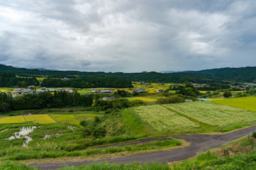 Aerial view of Japanese countryside town with fields