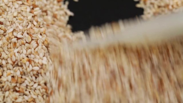 Sesame seed pan fried dry; extreme close up; 