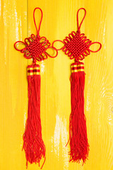 Chinese knot in yellow wood