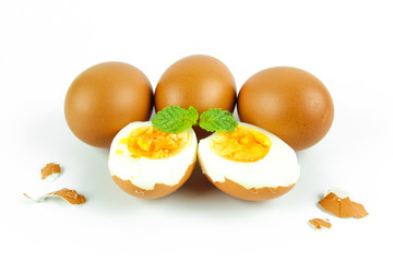 Boiled eggs cut in half isolated on white background