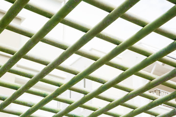 CROSSING GREEN PIPE ON TOP OF BUILDING