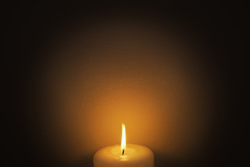 White candle and flame
