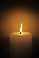 White candle and flame