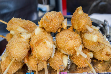 fried sausage in street market
