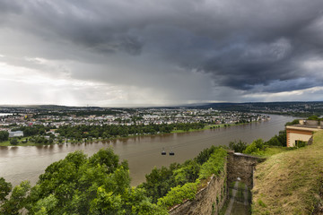 Fototapeta premium Dark Clouds Over The Rhine Valley In Koblenz, Germany