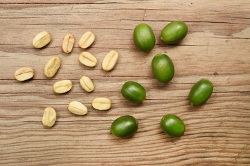 Fresh coffee bean on wooden background
