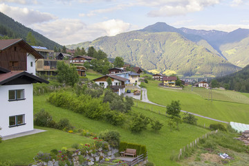 background landscape Alpine village under Innsbruck in Austria in the green valley among the mountains