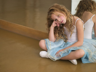 young ballerina sitting in studio © Alexander