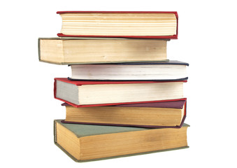 Stack of old books isolated on white background