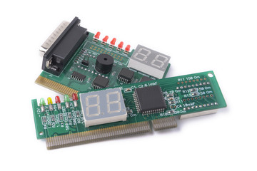 diferent devices for testing of motherboards on a white background, PC Diagnostics