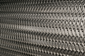 steel wire mesh,a metal basket weave design,sideways
