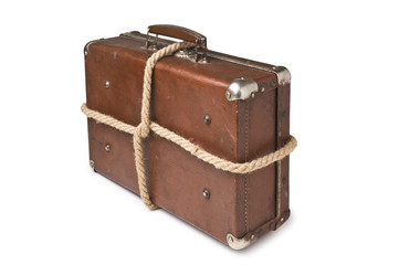 old suitcases tied with rope