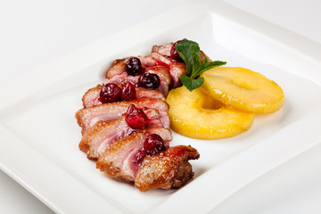 grilled duck meat with cherry sauce