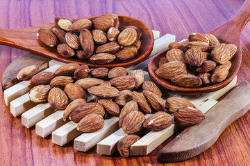 Almonds on  wooden background