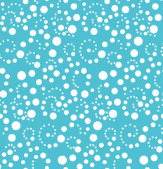 Christmas seamless pattern with polka dot snowflakes on a blue background. Vector illustration