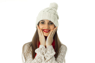brunette girl in warm sweater and red scarf