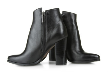 Female black boots isolated on a white background.