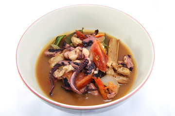 Thai style hot and sour soup Spicy squid isolated on white background