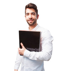 man holding a notebook