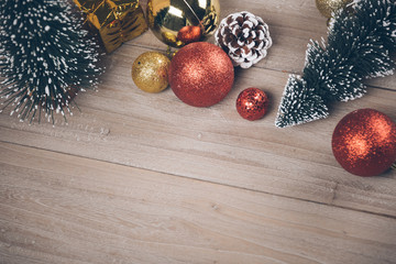 studio shot of christmas ornaments on wooden plank,retro style.