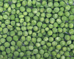 Frozen organic peas like artistic texture background