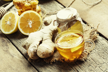 Useful tea against colds with honey, lemon and ginger. Vintage w