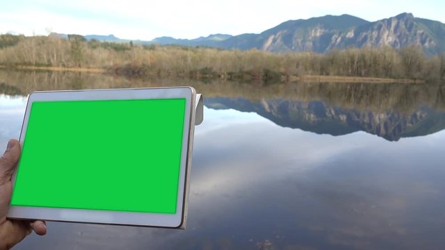 Green Screen Cutout Person Holding A Tablet Computer Gadget, Digital Technology Nature Scene