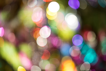 Obraz premium Defocused background decorated Christmas tree. The idea for postcards