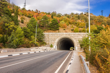 entrance to the tunnel in the mountain highway