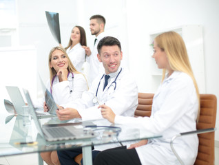 Fototapeta premium Portrait of confident happy group of doctors working at the medi