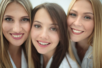 Cheerful team of doctors and interns make selfie