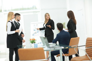 Business woman making a presentation at the office