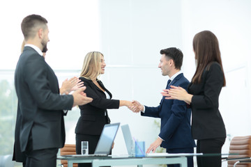Business people shaking hands, finishing up a meeting