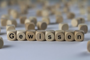 Obraz premium Gewissen - Holzwürfel mit Buchstaben