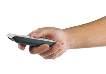 hand with remote control on white