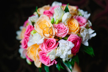 The rings on wedding bouquet