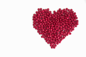 Plakat Big heart made from red and white tablets