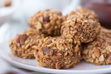 walnut balls close-up, ground nuts, a small depth of field