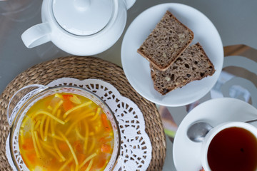 decorated table, a business lunch, hot soup, a cup of tea, Vegetarian