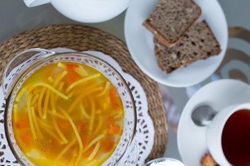 decorated table, a business lunch, hot soup, a cup of tea, Vegetarian