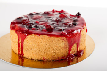 cake with berry jam, cheesecake on a white background