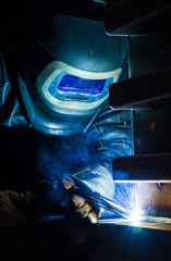 Industrial steel welder in factory