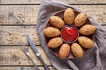 Kibbeh traditional middle eastern arabic lamb meat and bulgur kofta meatball croquettes food on vintage wooden table background