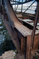 Old rusty bridge with rivets