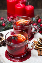 Winter hot drink with fruits and spices. Selective focus.